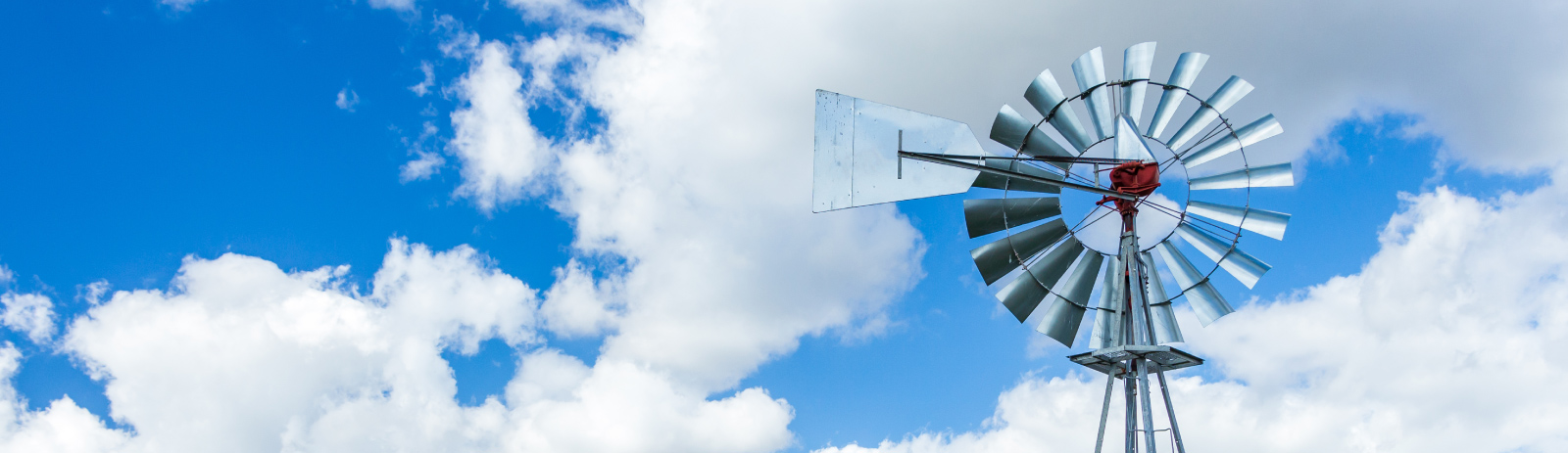 Windmill in front of blue sky