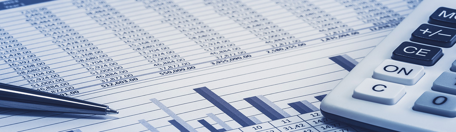 a calculator and pen sitting on top of a graph