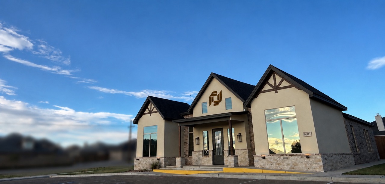Image of the front of a building with the bank's logo